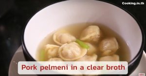 Pork pelmeni in a clear broth